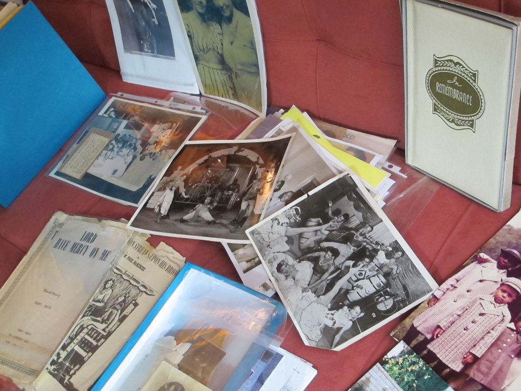 Review archival photos and artifacts before taking your genealogy vacation.